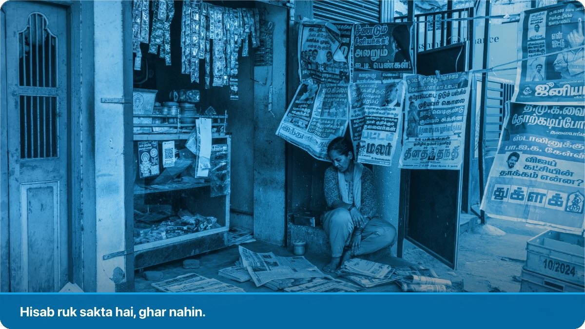 Janoobi Asia ki ek chhoti si gali wali dukan, bechne wala apne saman ke darmiyan khamoshi se baitha hua.